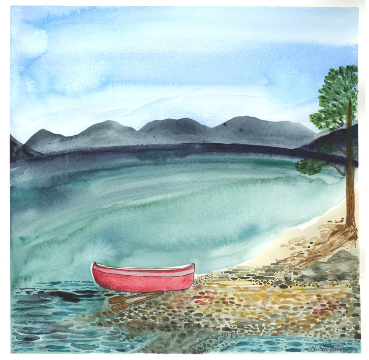 Watercolor landscape portrait of a small red canoe in the foreground sitting on a beach with a lake and mountain range in the background.